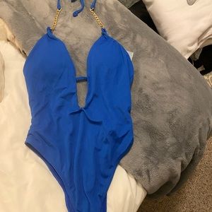 Never worn royal blue swimsuit